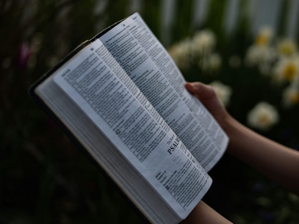 Refilled with God’s Word – person reading the Bible quietly for spiritual encouragement and renewal